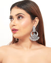 Earrings, designer earrings, fashion earrings, statement earrings, stud earrings, hoop earrings, drop earrings, dangle earrings, gold earrings, silver earrings, gemstone earrings, bridal earrings, traditional earrings, modern earrings, handcrafted earrings, pearl earrings, diamond earrings, ethnic earrings, trendy earrings, party wear earrings, daily wear earrings, luxury earrings.