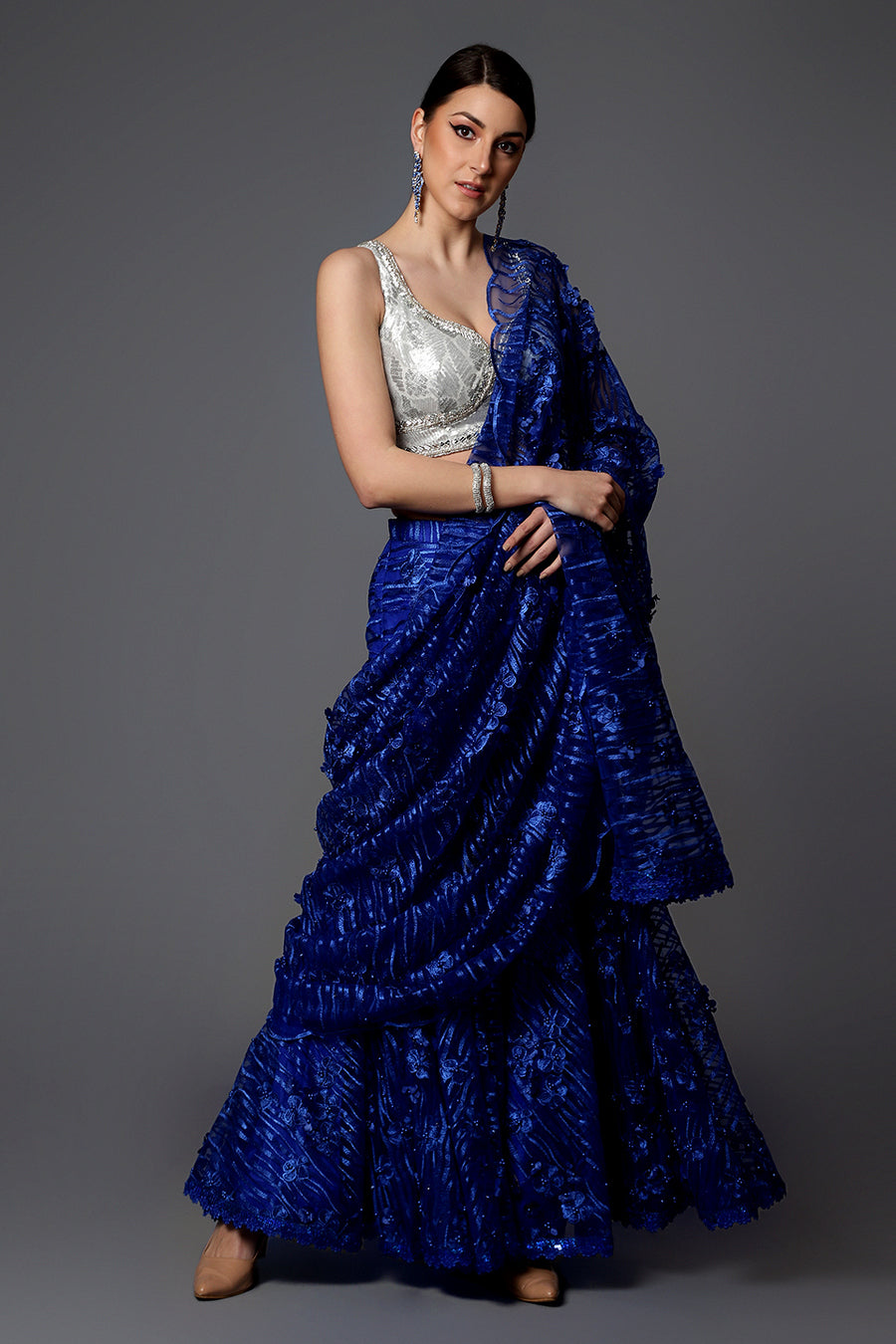 Ninecolours.com - Induce An Aura Of High-Fashion Glamour While Keeping The  Traditions At Bay In This One-Of-A-Kind Double Pallu Style Lehenga Saree  Embellished With Ribbon Embroidery Details. Drape them for Functions and